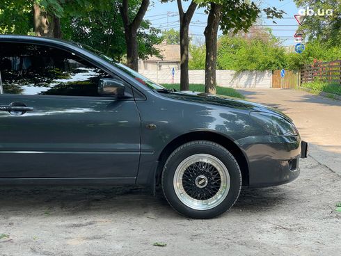 Mitsubishi Lancer 2003 черный - фото 4