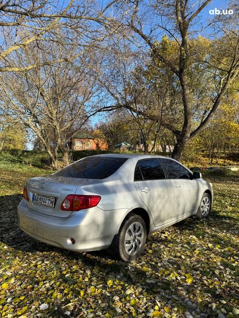 Toyota Corolla 2006 серый - фото 5