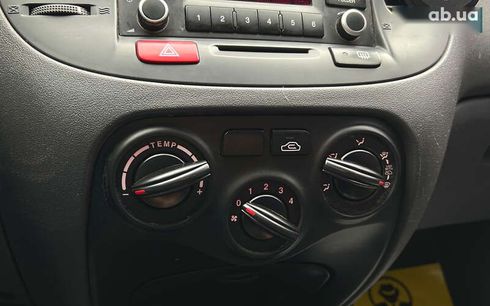 Kia Rio 2010 - фото 14
