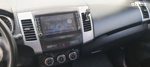 Mitsubishi Outlander XL 2011 черный - фото 9