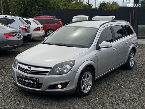 Opel Astra 2010 - фото 17