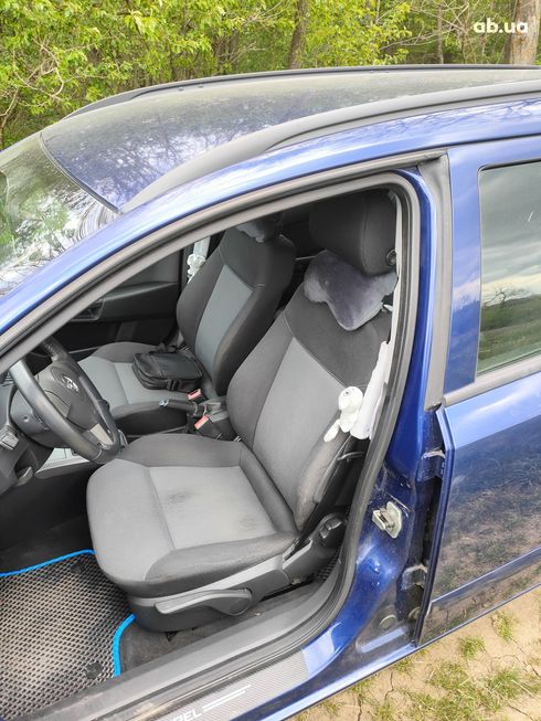 Opel Astra 2006 синий - фото 7