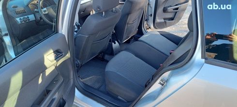 Opel Astra 2009 серебристый - фото 7