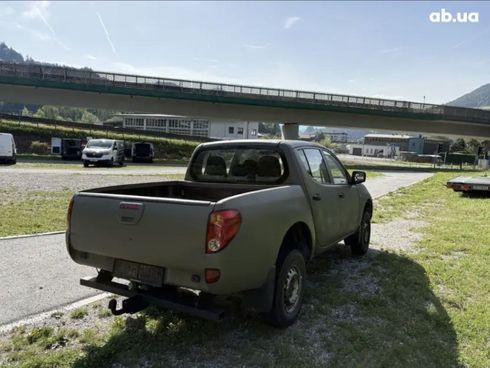 Mitsubishi L200 2010 зеленый - фото 11
