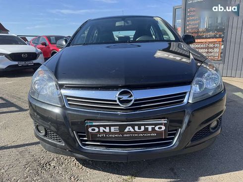 Opel Astra 2012 - фото 2