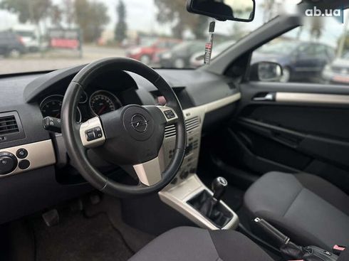 Opel Astra 2008 - фото 25