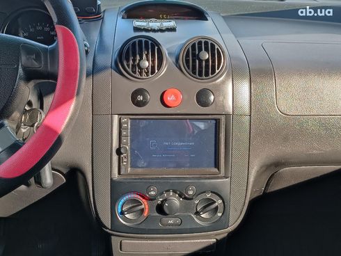 Chevrolet Aveo 2006 красный - фото 23