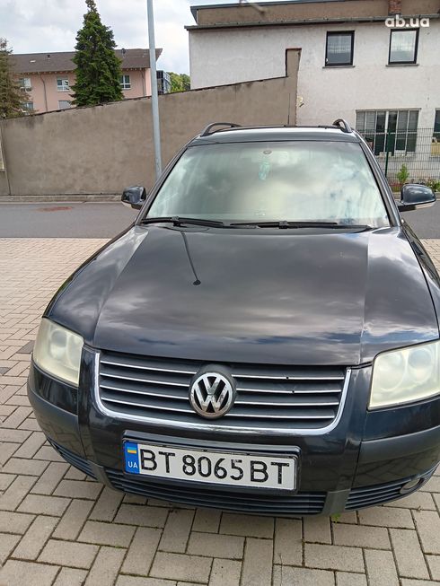 Volkswagen Passat 2004 черный - фото 11