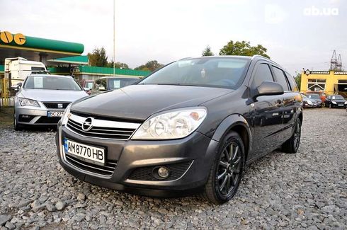 Opel Astra 2010 - фото 14