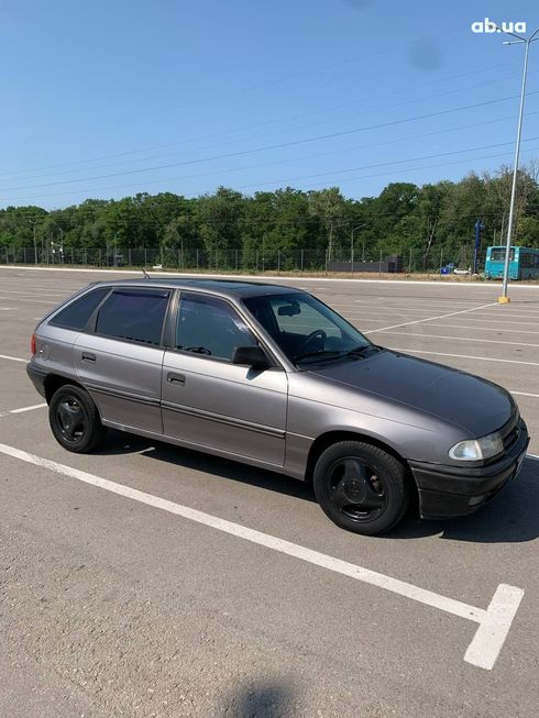 Opel Astra 1992 серый - фото 5