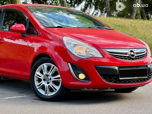 Opel Corsa 2011 - фото 5