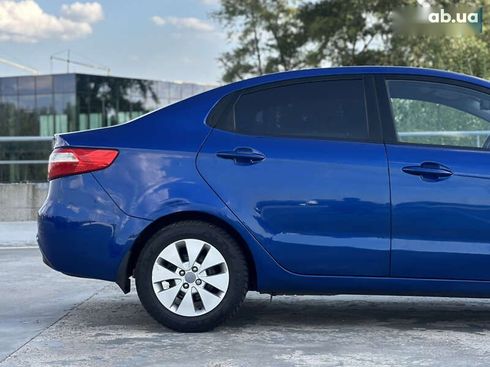 Kia Rio 2013 - фото 10