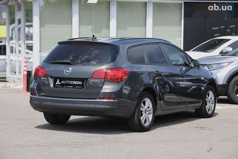 Opel Astra 2013 - фото 6