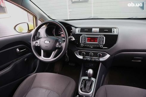 Kia Rio 2015 - фото 11