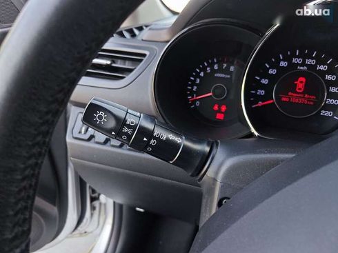 Kia Rio 2012 - фото 24