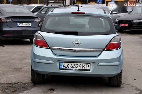 Opel Astra 2009 - фото 21