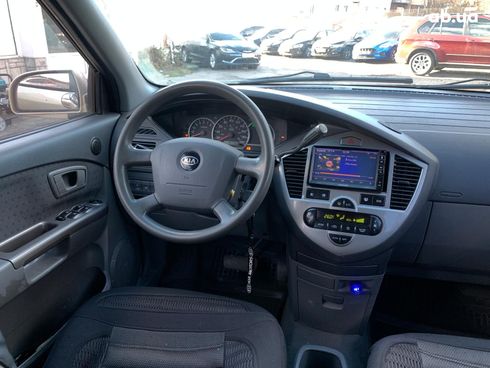Kia Carens 2003 бежевый - фото 30