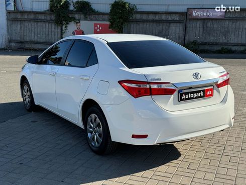 Toyota Corolla 2015 белый - фото 6