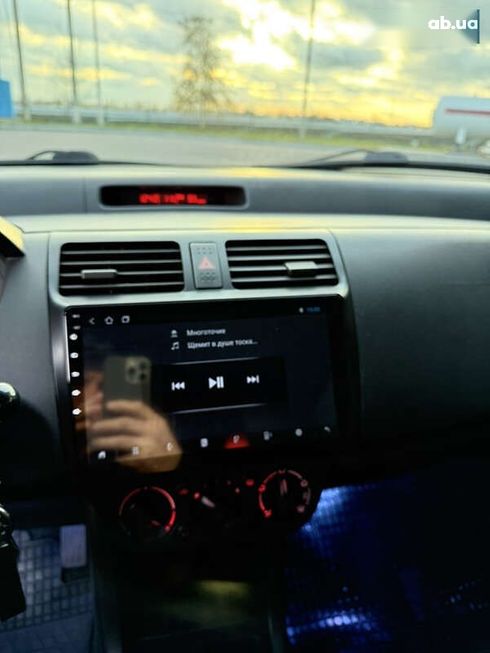 Suzuki Swift 2010 - фото 20