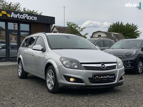 Opel Astra 2010 - фото 14