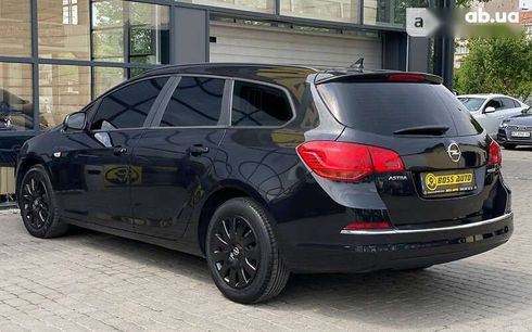 Opel Astra 2014 - фото 4