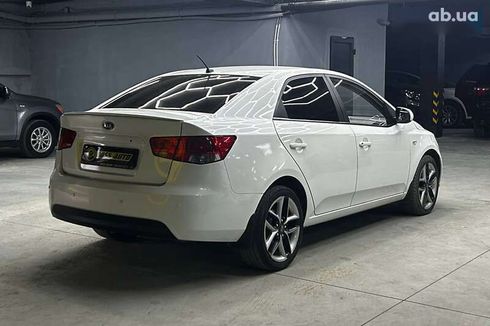 Kia Cerato 2011 - фото 6