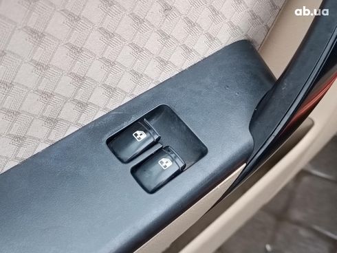 Chevrolet Aveo 2008 оранжевый - фото 28