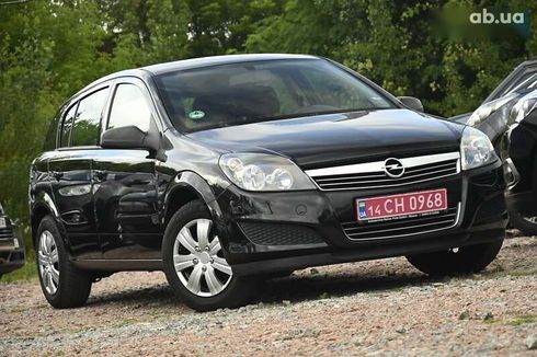 Opel Astra 2009 - фото 2