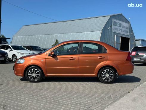 Chevrolet Aveo 2007 оранжевый - фото 4