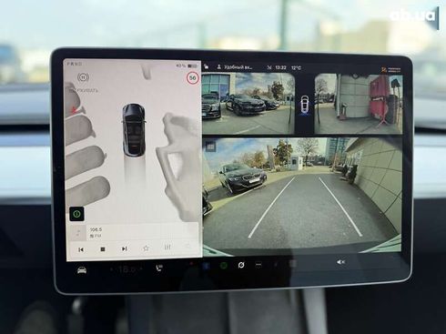 Tesla Model Y 2024 - фото 26