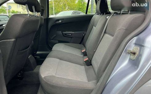 Opel Astra 2009 - фото 23