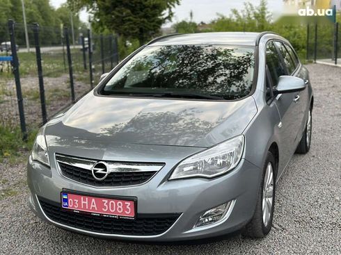 Opel Astra 2010 - фото 8