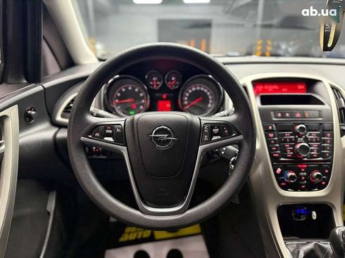 Opel Astra 2010 - фото 11