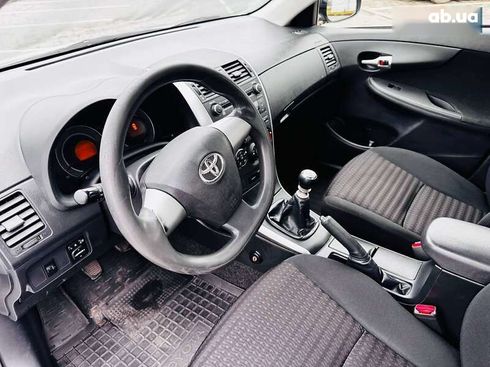 Toyota Corolla 2012 - фото 25