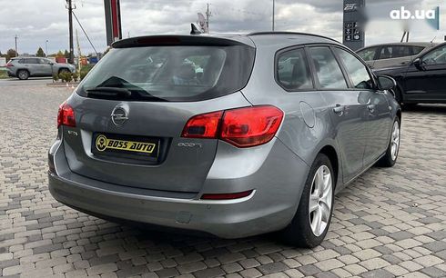 Opel Astra 2011 - фото 7