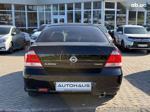 Nissan Almera 2012 - фото 7