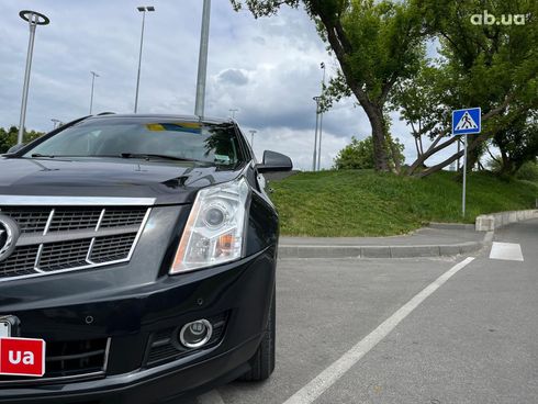 Cadillac SRX 2011 черный - фото 12