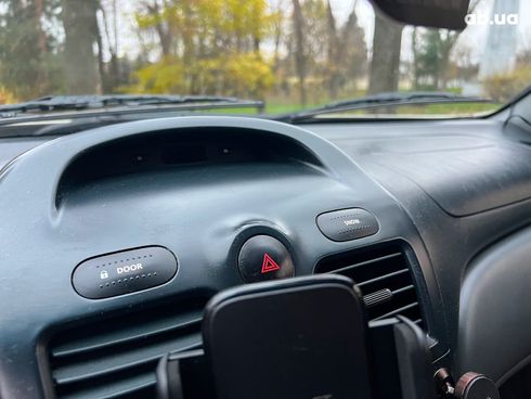 Nissan Almera 2006 бежевый - фото 16