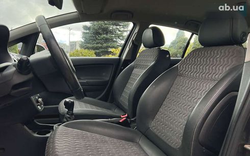 Opel Corsa 2011 - фото 14