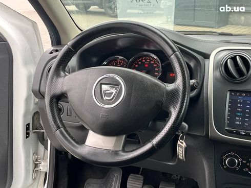 Dacia Logan 2015 белый - фото 12