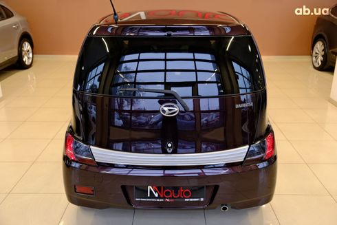 Daihatsu Materia 2008 вишневый - фото 6