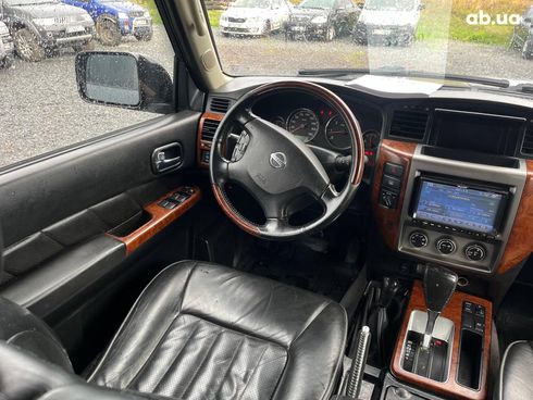 Nissan Patrol 2009 серый - фото 35