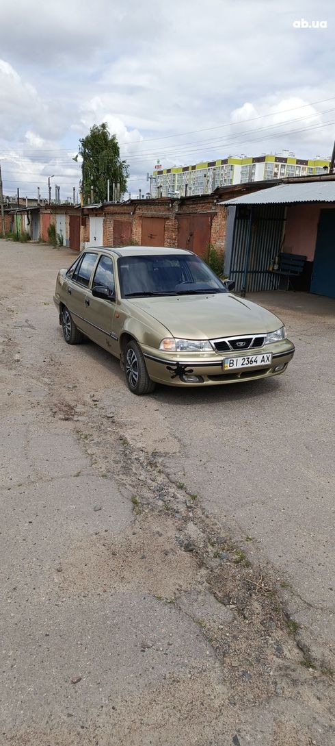 Daewoo Nexia 2008 золотистый - фото 12