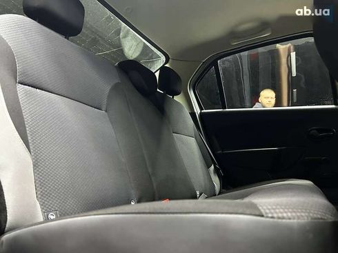 Renault Logan 2015 - фото 16