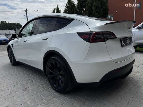 Tesla Model Y 2024 - фото 15