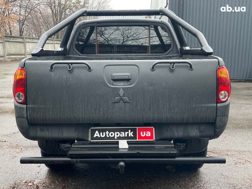 Mitsubishi l 200 2008 черный - фото 8