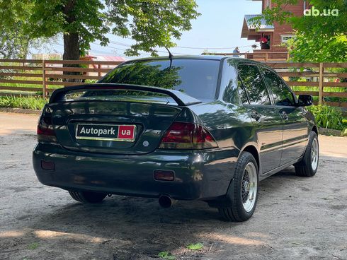Mitsubishi Lancer 2003 черный - фото 7