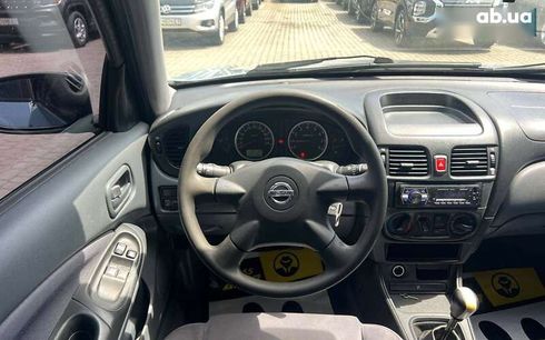 Nissan Almera 2004 - фото 13