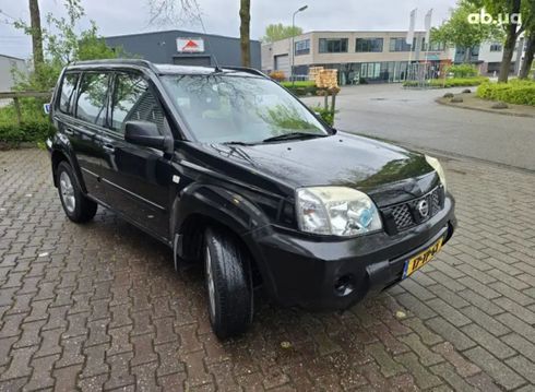Nissan Navara 2006 черный - фото 13