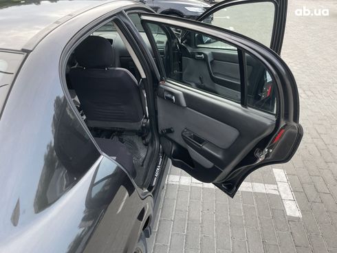 Opel Astra G 2008 черный - фото 10